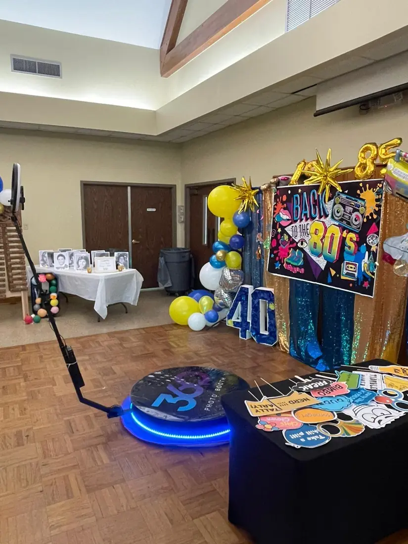 360 booth platform glowing blue at a Back to the 80s reunion